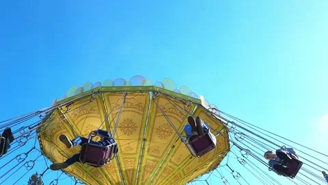 Children ride on a carousel Stock Footage 278827113