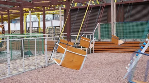 Children ride on a carousel. Summer fun in the amusement park. Stock Footage 170662749