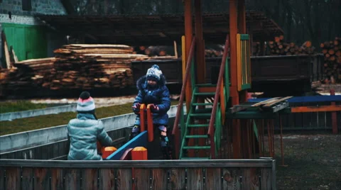 Children Ride on a Swing Stock Footage 60989809