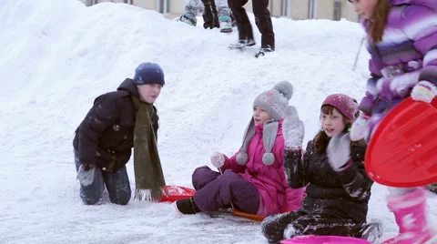 Children ride on the Winter Hill Stock Footage 45667356