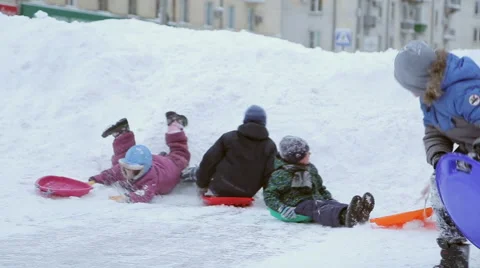 Children ride on the Winter Hill Stock Footage 45667417