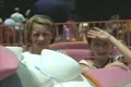 Children riding Dumbo fairground ride Footage