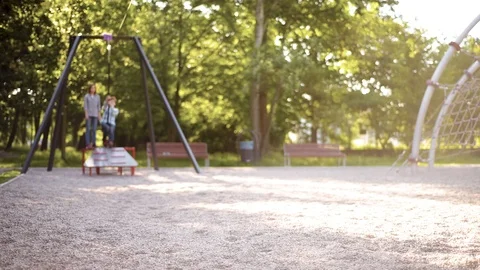 Children riding on zip line Stock Footage 90302610