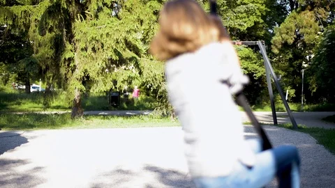 Children riding on zip line Stock Footage 90303321
