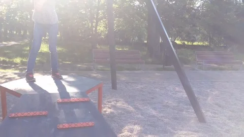 Children riding on zip line Stock Footage 90303373