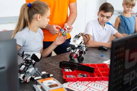 Children in a robotics class in the classroom. Stock Photos