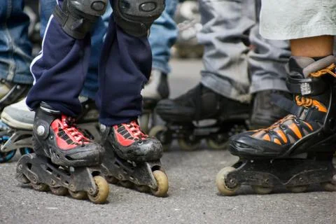 Children on the rollers Stock Photos
