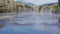Children romping in fountain at Promenade du Paillon in Nice, summer holidays HD Footage