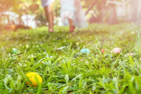 Children run for easter eggs hunting Stock Photos