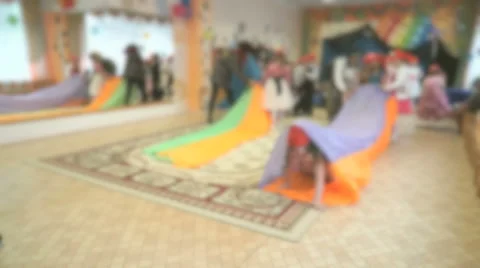 Children run, play educational games in the hall Stockbeeldmateriaal 64496863