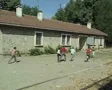 Children running alongside train SD Footage