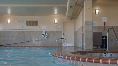 Children running and jumping into a pool Stock-Footage 106628178