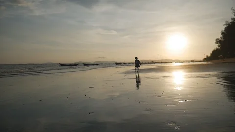 Children running on the beach Stock Footage 96670082