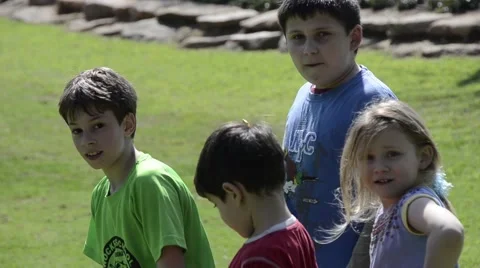 Children running on the grass Stock Footage 47599649