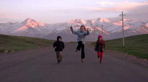 Children Running on the Road Stock Footage 38530197