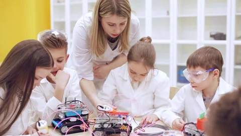 Children at school are studying a 3d printing pen Stock Footage 87166439