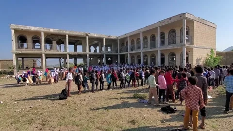 Children in a school destroyed by war Stock Footage 160577205