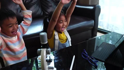 Children with school work from home. Working from home during the Corona Virus p 動画素材 221179571