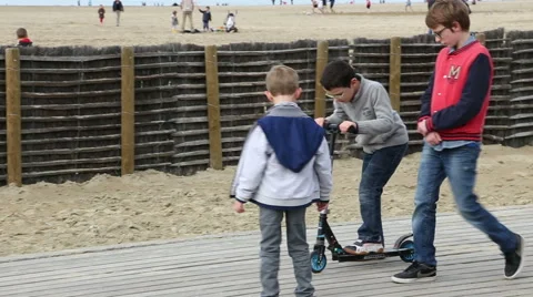 Children on scooters Stock Footage 61561185