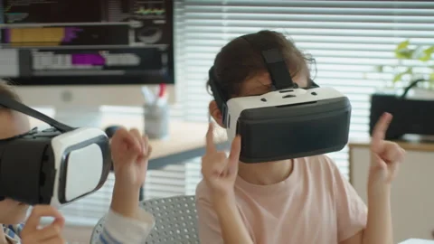 Children Seeing Virtual World in AR Headset at Computer Class Stock Footage 280542687