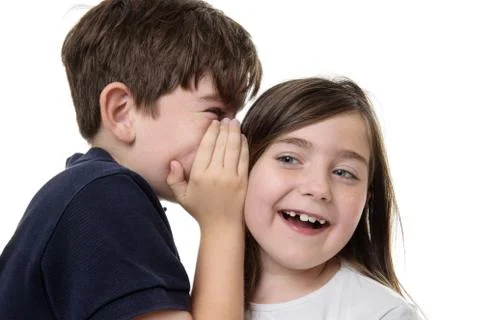 Children sharing a secret Stock Photos