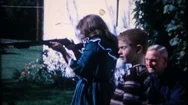Children Shoot A Bb Gun While Grandpa Watches 1950S Home Movie 3867 Stock Footage