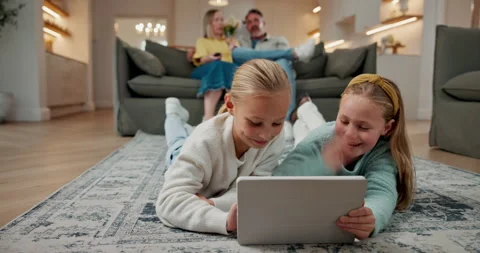 Children, sisters and high five in home with tablet, learning game or bonding Stock Footage 337927239