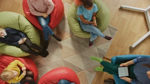 Children Sitting on Bean bags while Teac... | Stock Video | Pond5
