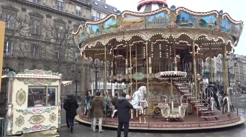 Children sitting in a carousel in Paris Stock Footage 59922571