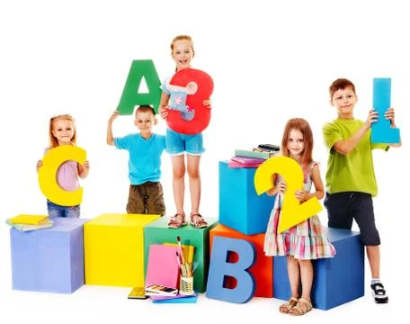 Children sitting at cube. Stock-Fotos