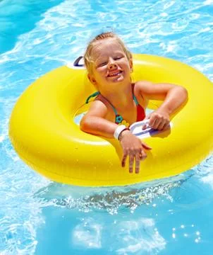 Children sitting on inflatable ring. Stock-Fotos
