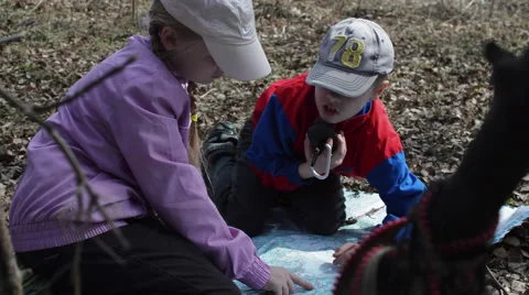 Children Sitting Look at the Map of the Campaign. Near Stock Footage 62417571