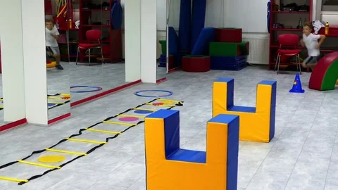 Children skipping obstacles on the training ground. Stock Footage 83625084