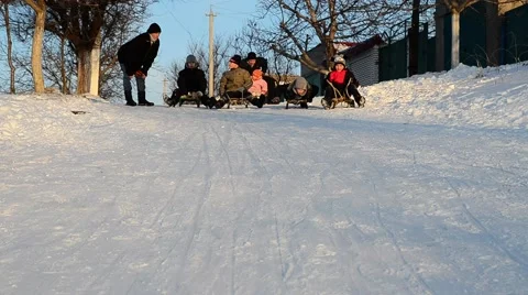 Children sledding. Stock Footage 45987146