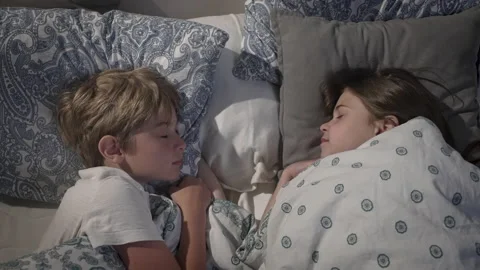 Children sleeping in bed. Stock Footage 165535741