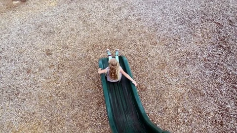 Children slide down, one after another, moving shot HD Stock-Footage 80237217