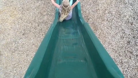 Children slide down, one after another HD Video stock 80237224