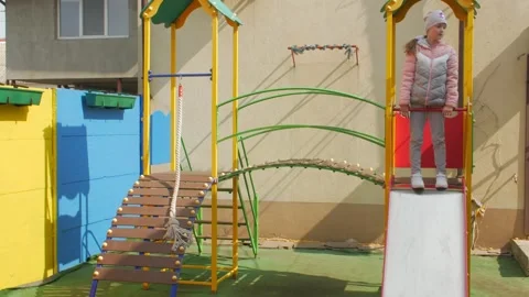 Children Slide Down The Slide Stock Footage 151572119