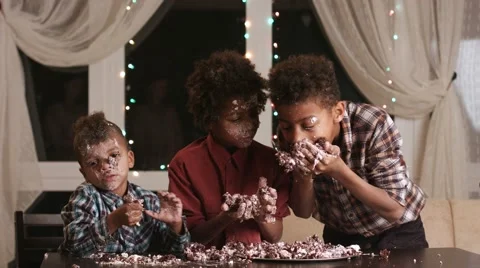 Children smeared in cake. Stock Footage