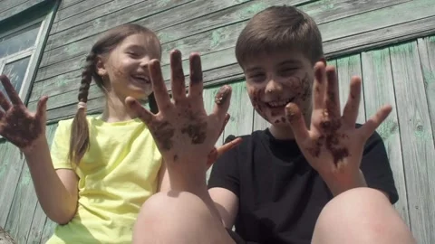 Children smeared in the chocolate Stock Footage 159614193