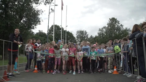Children stand at the start before the run Stock Footage 130004643