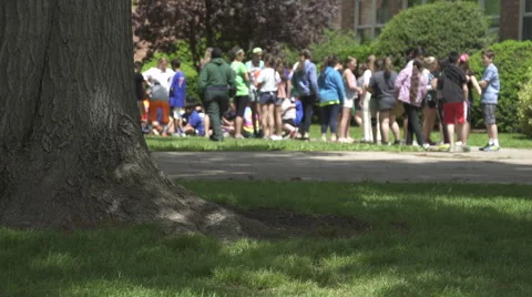 Children standing outside a school Stock Footage 50418609