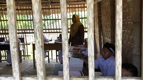 Children study at his broken school 스톡 동영상 211320691