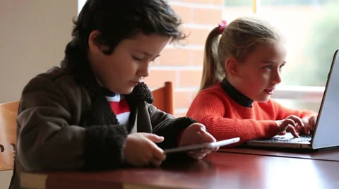 Children studying at classroom Видео 34586768