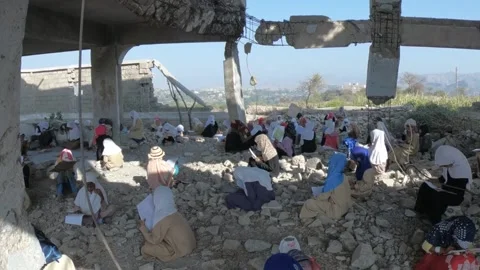 Children studying in a destroyed school due to the war in Yemen, Taiz Stock Footage 194564208