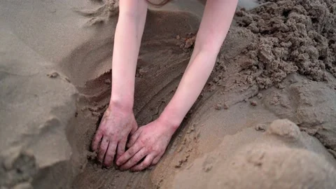 Children on summer vacation making on beach building sand castle together. kids Stock Footage 199232034
