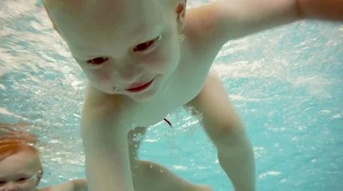 Children at a swimming pool Video stock 11859503