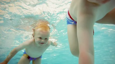 Children at a swimming pool Stock Footage 11859530