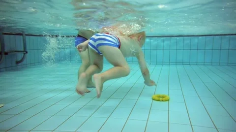 Children at a swimming pool Stock Footage 11859618
