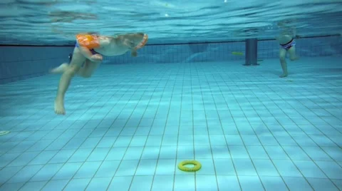 Children at a swimming pool Video stock 11859803